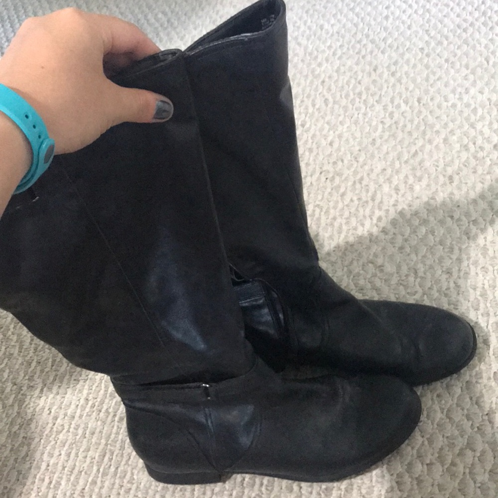 Tall black leather boots